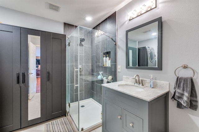 6318 White Oaks Ln, Frisco, TX 75035 - bathroom with vanity, a shower stall, and tile patterned floors