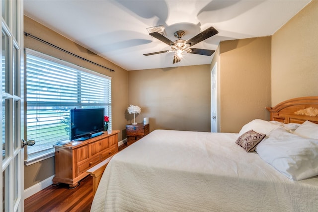 6318 White Oaks Ln, Frisco, TX 75035 - bedroom featuring wood finished floors and a ceiling fan