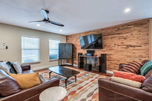6318 White Oaks Ln, Frisco, TX 75035 - living area featuring wood walls, wood finished floors, ceiling fan, and recessed lighting