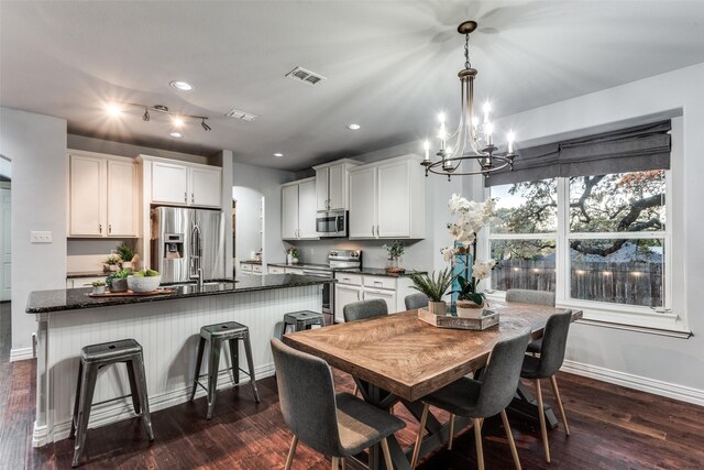 759 Bancroft Rd, Keller, TX 76248 - dining space with a chandelier, dark wood-type flooring, and recessed lighting