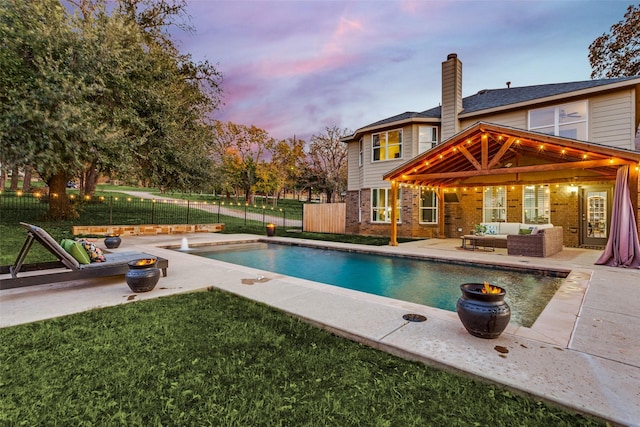 759 Bancroft Rd, Keller, TX 76248 - pool at dusk with an outdoor hangout area, a gazebo, a patio, and a fenced backyard