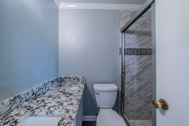 1825 Emerald Dr, Irving, TX 75060 - bathroom with a stall shower, ornamental molding, and vanity