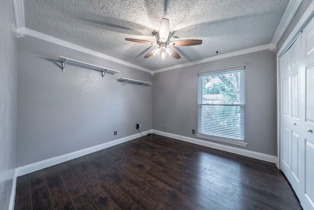 1825 Emerald Dr, Irving, TX 75060 - empty room featuring a textured ceiling, a ceiling fan, dark wood-style flooring, and crown molding