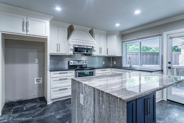 1825 Emerald Dr, Irving, TX 75060 - kitchen featuring appliances with stainless steel finishes, custom exhaust hood, tasteful backsplash, light stone countertops, and white cabinets