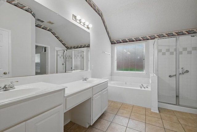 3516 San Patricio Dr, Plano, TX 75025 - full bathroom with vaulted ceiling, a stall shower, double vanity, a garden tub, and tile patterned floors