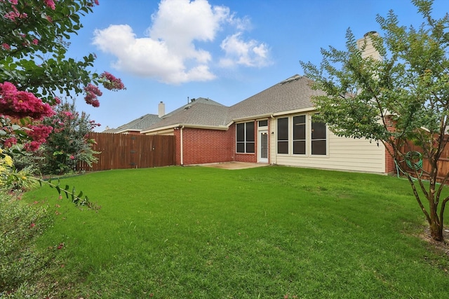 3516 San Patricio Dr, Plano, TX 75025 - back of property with a fenced backyard, a patio area, brick siding, and a shingled roof