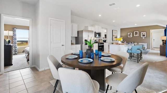 139 Gerber Ln, Boyd, TX 76023 - dining area featuring light tile patterned flooring and recessed lighting