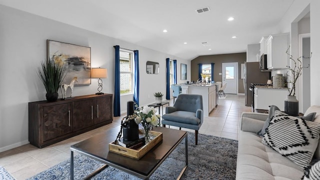 139 Gerber Ln, Boyd, TX 76023 - living room featuring light tile patterned flooring and recessed lighting