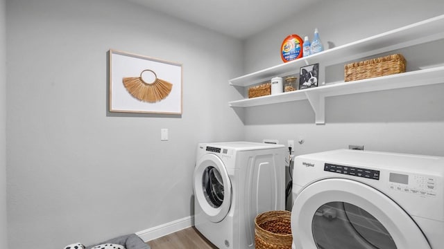 1270 Quartzite St, Cedar Hill, TX 75104 - washroom with washing machine and dryer and wood finished floors