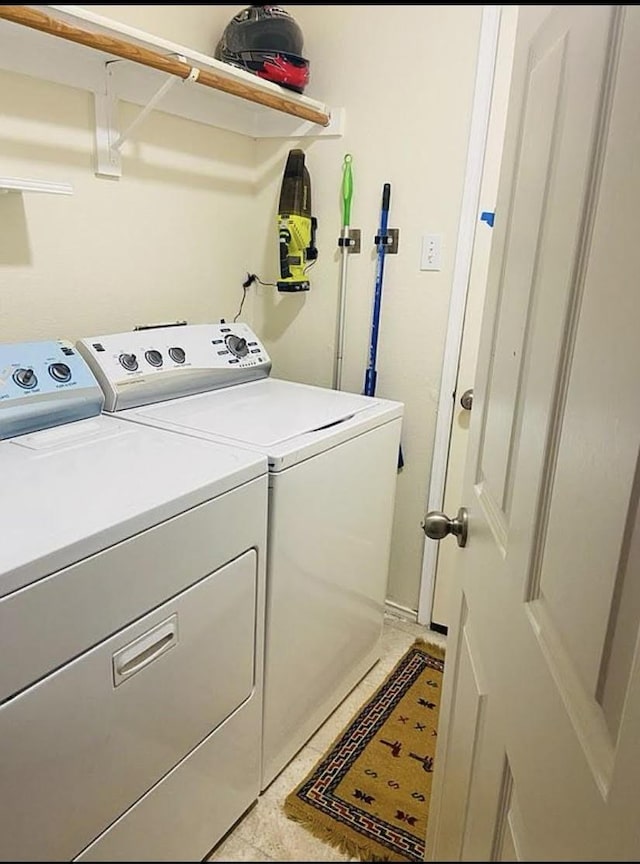 2009 Reddenson Dr, Carrollton, TX 75010 - laundry area with washing machine and clothes dryer