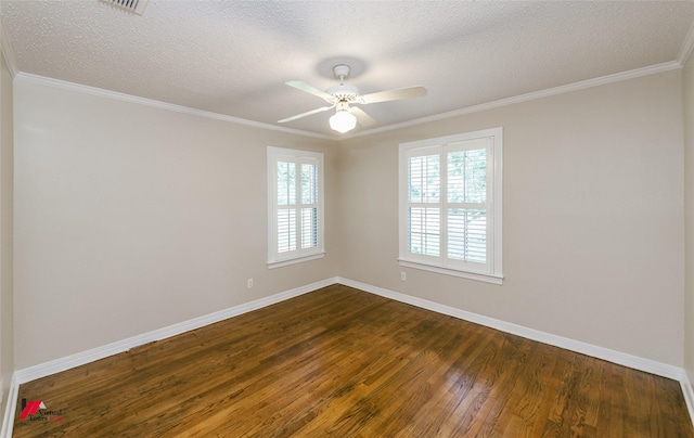 416 Albany Ave, Shreveport, LA 71105 - spare room with dark wood-type flooring, a ceiling fan, a textured ceiling, and crown molding