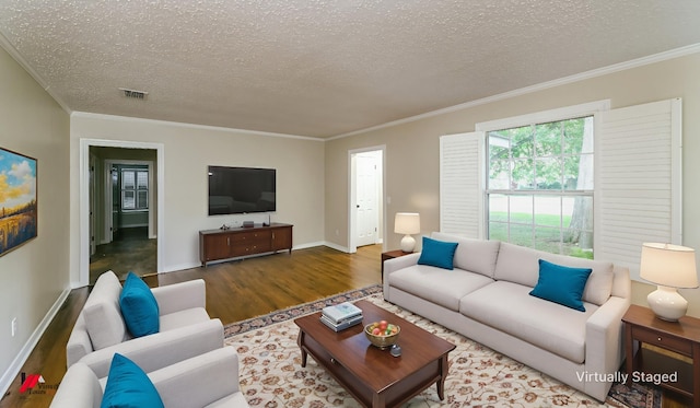 416 Albany Ave, Shreveport, LA 71105 - living room with wood finished floors, a textured ceiling, and crown molding
