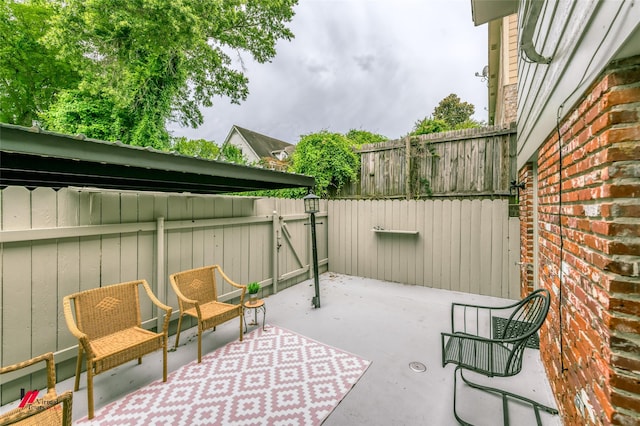 719 Edgemont St, Shreveport, LA 71106 - fenced backyard with a patio and a gate