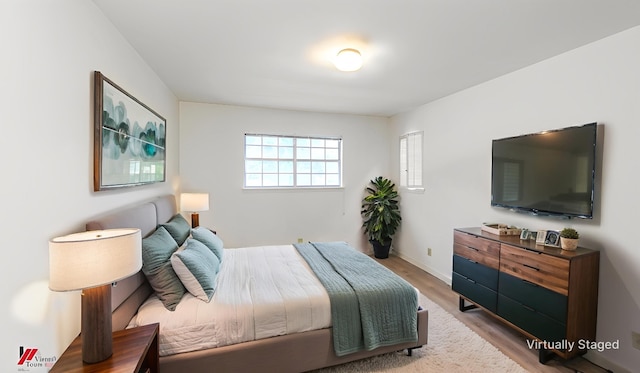 719 Edgemont St, Shreveport, LA 71106 - bedroom featuring wood finished floors