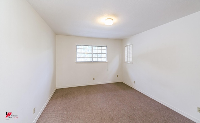 719 Edgemont St, Shreveport, LA 71106 - carpeted spare room with baseboards