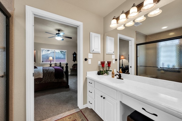 210 Oleander Pl, Waxahachie, TX 75165 - full bath with ensuite bathroom, vanity, a shower with shower door, and a ceiling fan