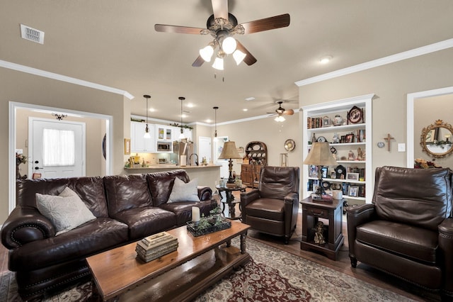 210 Oleander Pl, Waxahachie, TX 75165 - living room featuring a ceiling fan, wood finished floors, ornamental molding, and recessed lighting