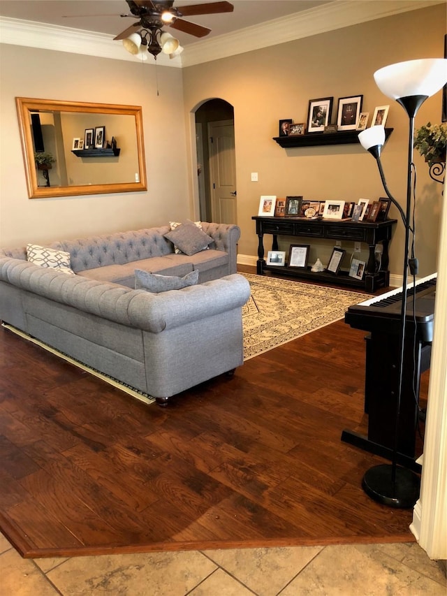 413 Fair Oaks St, Bossier City, LA 71112 - living area with arched walkways, ceiling fan, ornamental molding, and wood finished floors