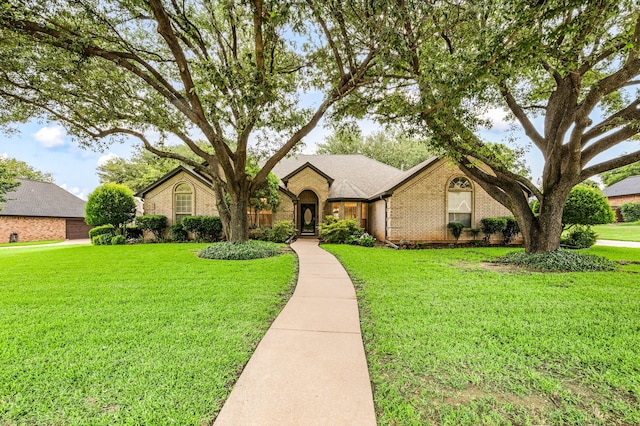 817 Tall Oak Ln, Keller, TX 76248 - view of front facade with brick siding and a front yard