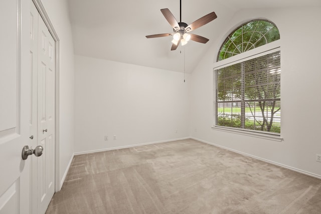 817 Tall Oak Ln, Keller, TX 76248 - empty room with vaulted ceiling, a ceiling fan, carpet flooring, and healthy amount of natural light
