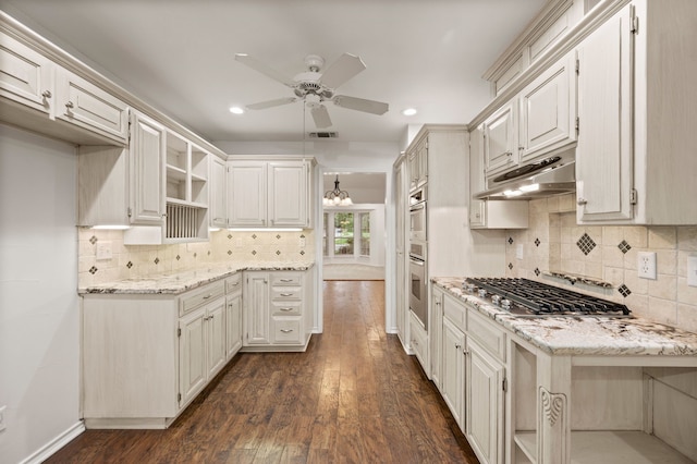 817 Tall Oak Ln, Keller, TX 76248 - kitchen with under cabinet range hood, open shelves, stainless steel appliances, a ceiling fan, and backsplash