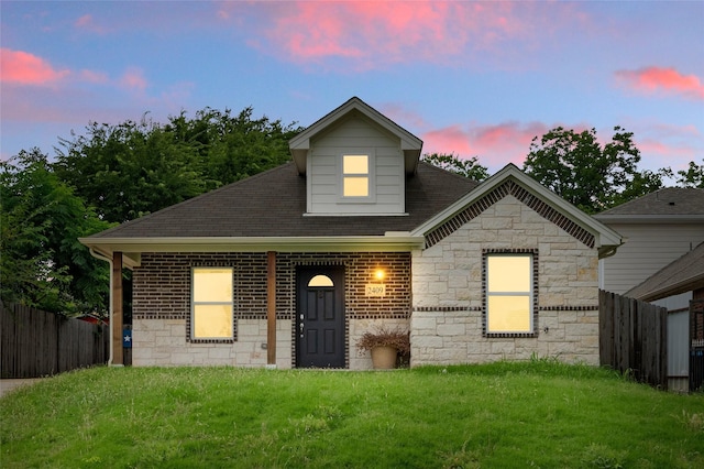 2409 Ross Ave, Fort Worth, TX 76164 - view of front facade featuring stone siding and roof with shingles