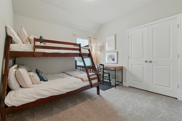 2409 Ross Ave, Fort Worth, TX 76164 - bedroom with carpet flooring, vaulted ceiling, and a closet