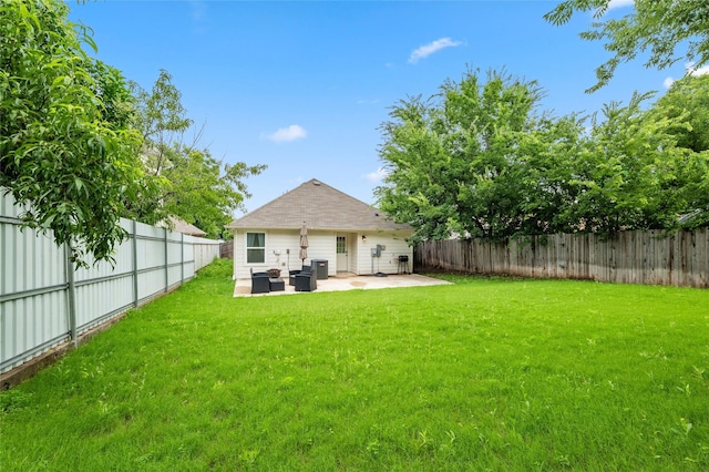 2409 Ross Ave, Fort Worth, TX 76164 - back of house featuring a patio and a fenced backyard