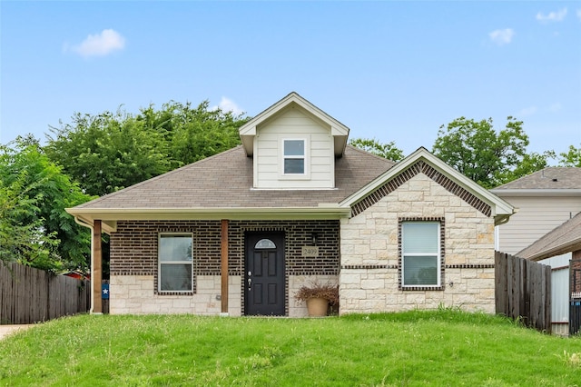 2409 Ross Ave, Fort Worth, TX 76164 - view of front of property featuring stone siding and a shingled roof