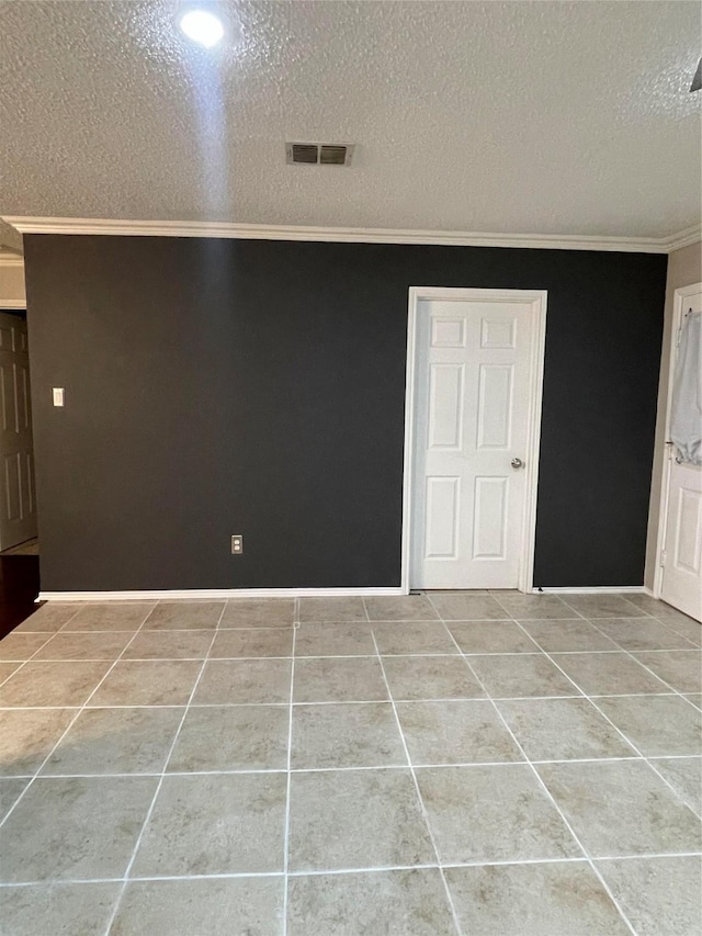 8732 Fox Meadow Way, Fort Worth, TX 76123 - unfurnished room with crown molding, tile patterned flooring, and a textured ceiling