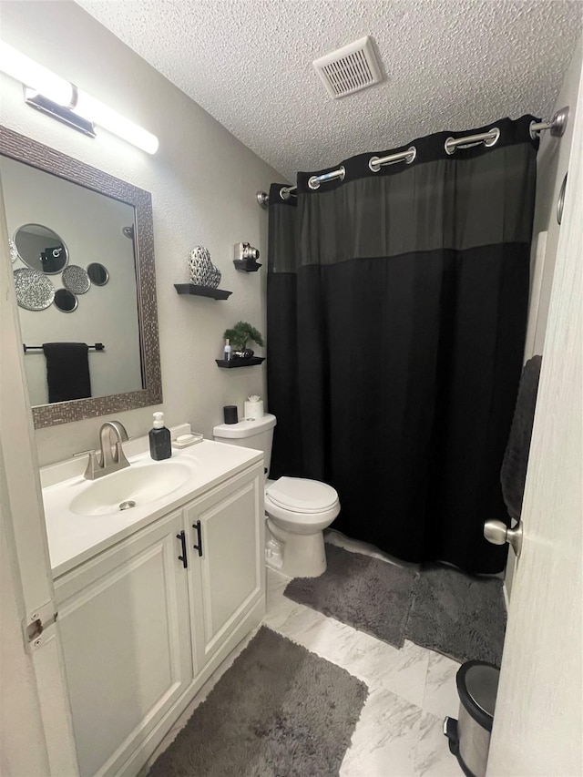 8732 Fox Meadow Way, Fort Worth, TX 76123 - full bath with a textured ceiling, vanity, a shower with curtain, and marble finish flooring