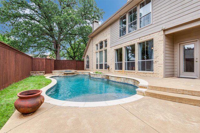 2804 Stonehurst Dr, Grapevine, TX 76051 - view of pool featuring a patio area, a fenced backyard, and a pool with connected hot tub