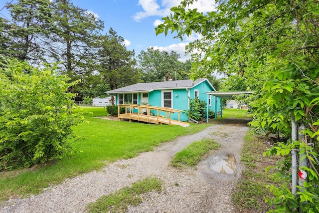84 Kristin Dr, Pottsboro, TX 75076 - bungalow-style house with driveway, a front yard, a wooden deck, and a chimney