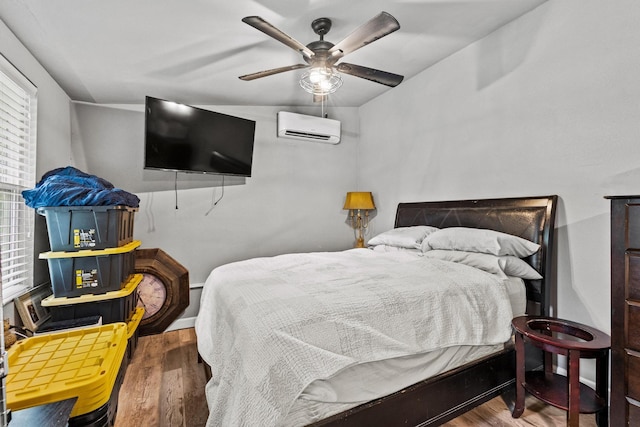 84 Kristin Dr, Pottsboro, TX 75076 - bedroom featuring an AC wall unit, wood finished floors, and a ceiling fan
