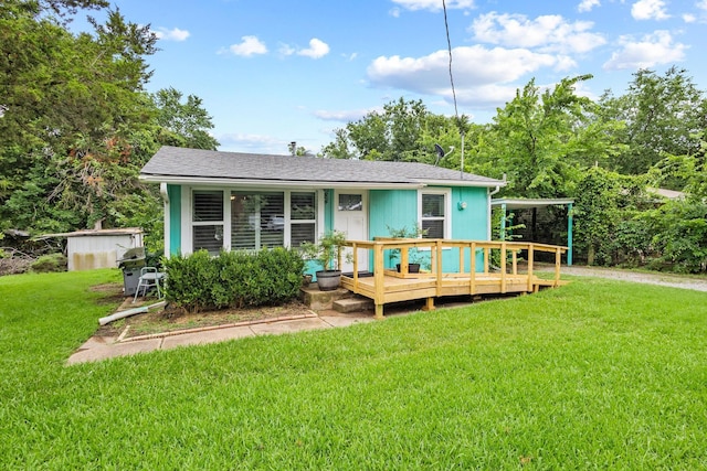 84 Kristin Dr, Pottsboro, TX 75076 - back of property with a lawn and a deck