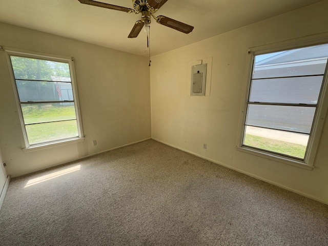 3560 Regal Rd, Fort Worth, TX 76111 - spare room featuring plenty of natural light, electric panel, carpet floors, and ceiling fan