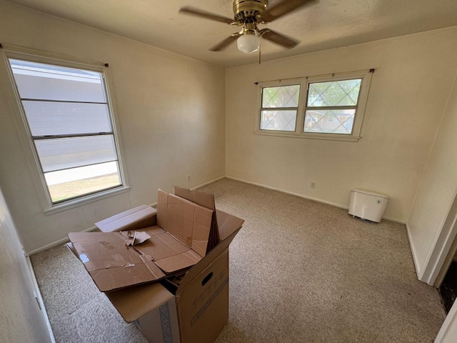 3560 Regal Rd, Fort Worth, TX 76111 - carpeted spare room with a ceiling fan and baseboards