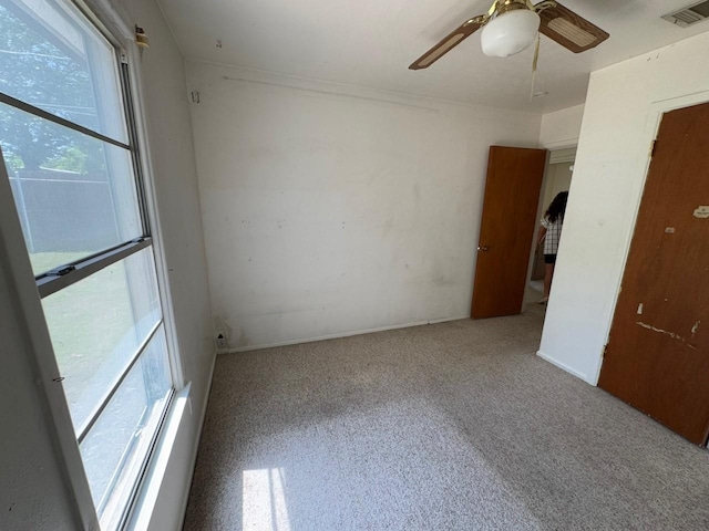 3560 Regal Rd, Fort Worth, TX 76111 - unfurnished room with a ceiling fan and carpet floors