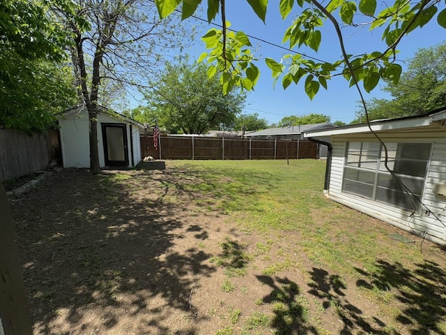 3560 Regal Rd, Fort Worth, TX 76111 - fenced backyard featuring a storage shed