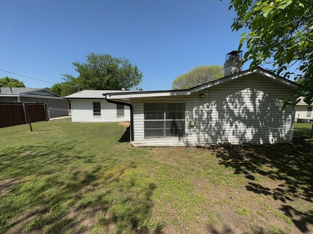 3560 Regal Rd, Fort Worth, TX 76111 - back of property featuring a chimney