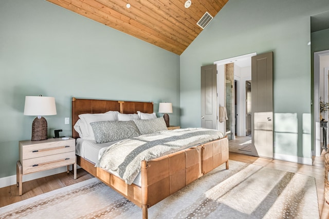 3560 Pleasant Run Cir, Athens, TX 75752 - bedroom with high vaulted ceiling, wood ceiling, and light wood-style flooring