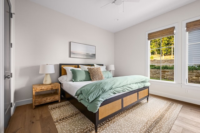 3560 Pleasant Run Cir, Athens, TX 75752 - bedroom featuring wood finished floors and ceiling fan