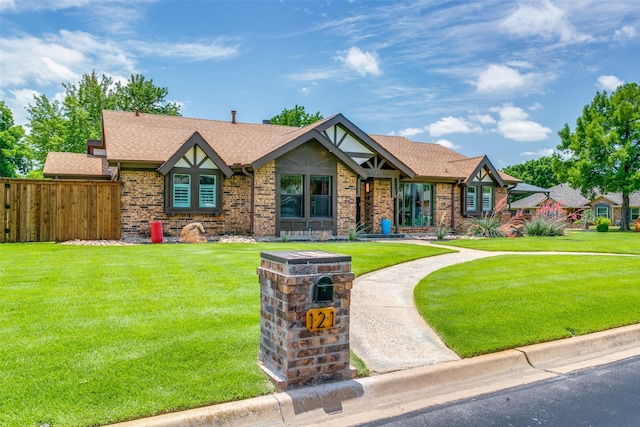 121 E Louella Dr, Hurst, TX 76054 - tudor home with brick siding and roof with shingles