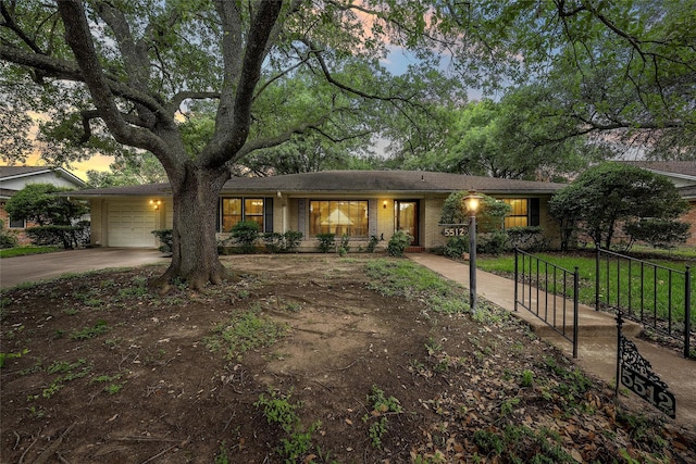 5512 Lake Charles Dr, Waco, TX 76710 - single story home featuring a garage, brick siding, and driveway