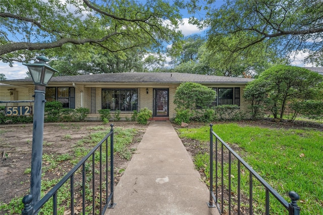 5512 Lake Charles Dr, Waco, TX 76710 - ranch-style home featuring brick siding