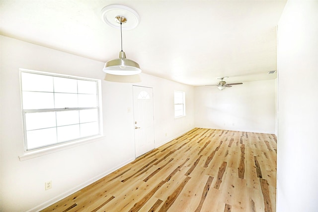 103 Wise St, Nocona, TX 76255 - foyer entrance with light wood finished floors and ceiling fan