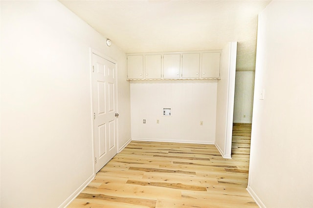 103 Wise St, Nocona, TX 76255 - laundry room featuring washer hookup and light wood finished floors