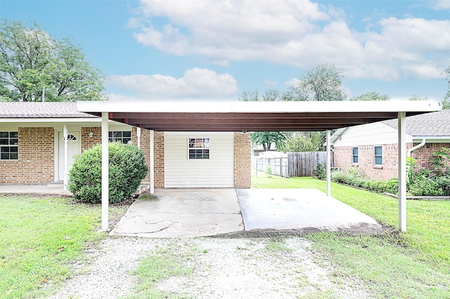103 Wise St, Nocona, TX 76255 - view of vehicle parking featuring a carport and driveway