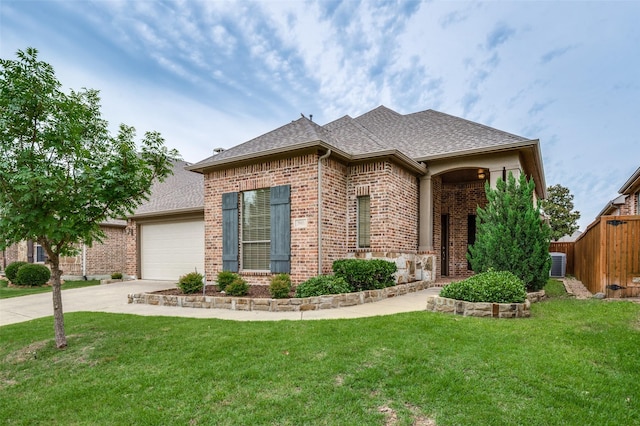 7601 Willowbend Dr, Mckinney, TX 75071 - french provincial home with brick siding, driveway, roof with shingles, and a garage