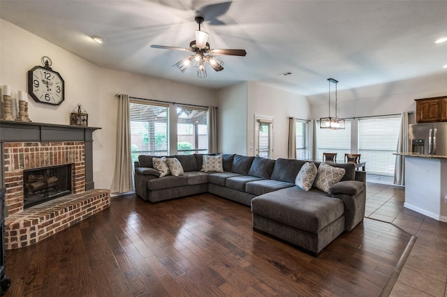 7601 Willowbend Dr, Mckinney, TX 75071 - living area with a ceiling fan, dark wood finished floors, a brick fireplace, and recessed lighting